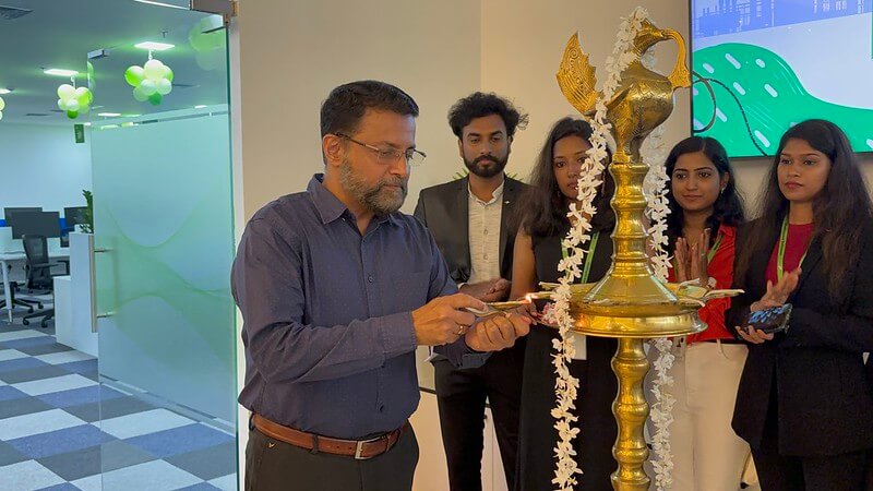 CEO Technopark, Col. Sanjeev Nair (Retd.) lighting the auspicious lamp to mark the inauguration of the new ShellSquare office space at Kabani, Technocity.