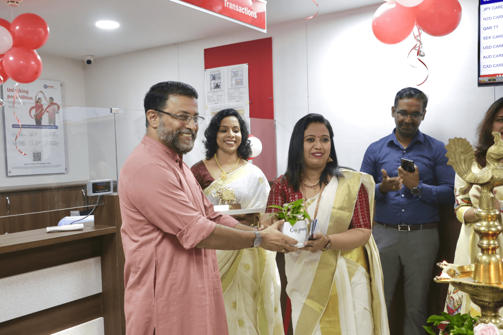 CEO Technopark, Col Sanjeev Nair (Retd.). being felicitated at the opening of the first branch of Kotak Mahindra Bank in Technopark.