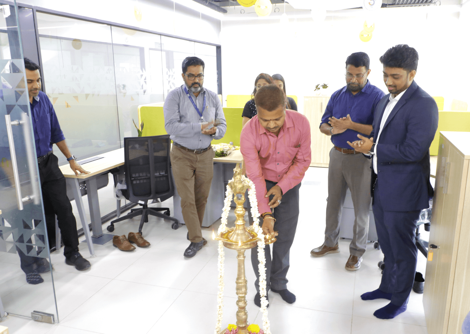 Lighting the ceremonial lamp.