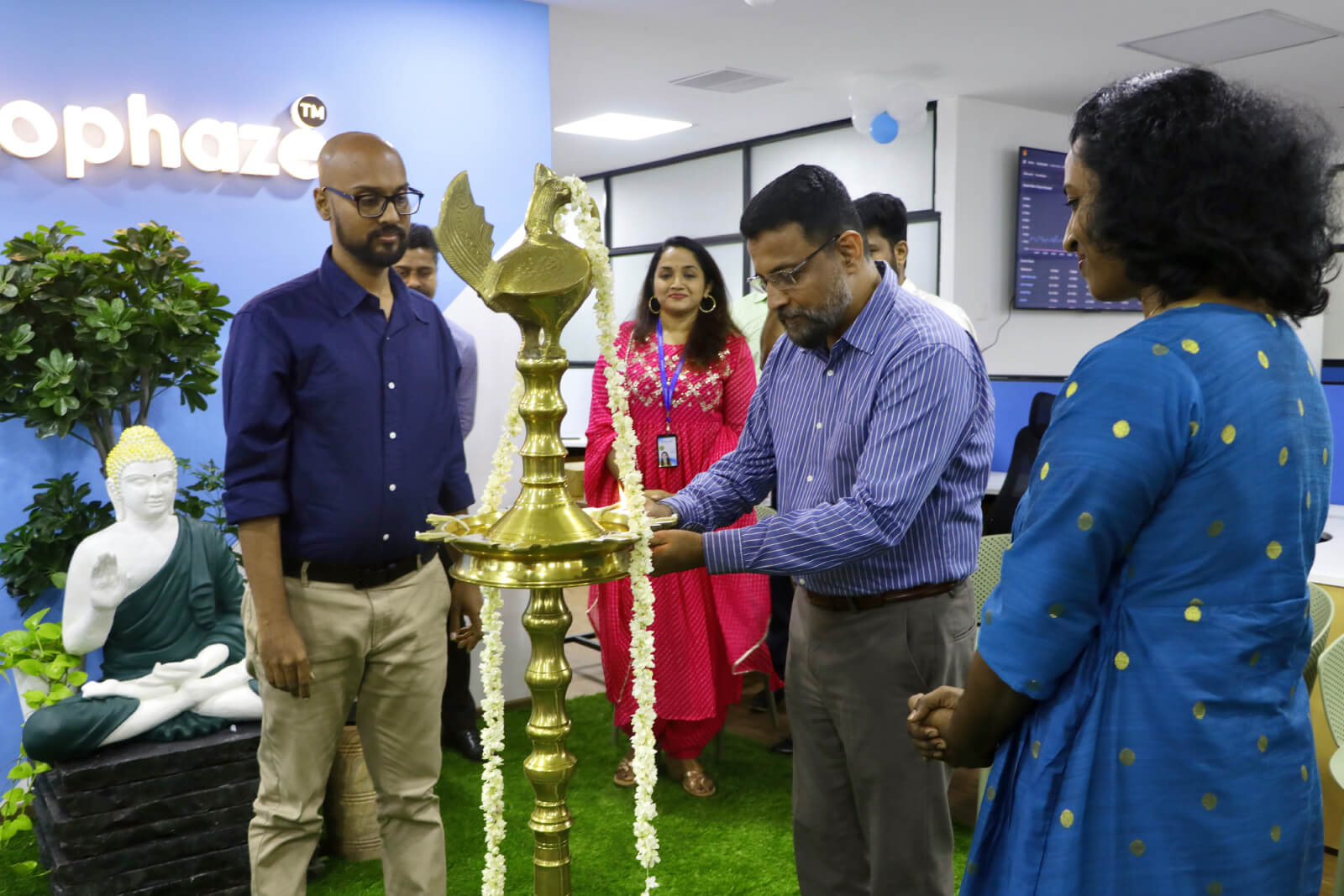 Col Sanjeev Nair (Retd), CEO Technopark, lighting the inaugural lamp.