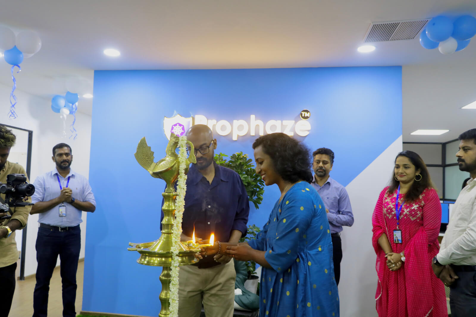 Ms. Lakshmi Das, COO, Prophaze,  lighting the auspicious lamp at the inauguration.