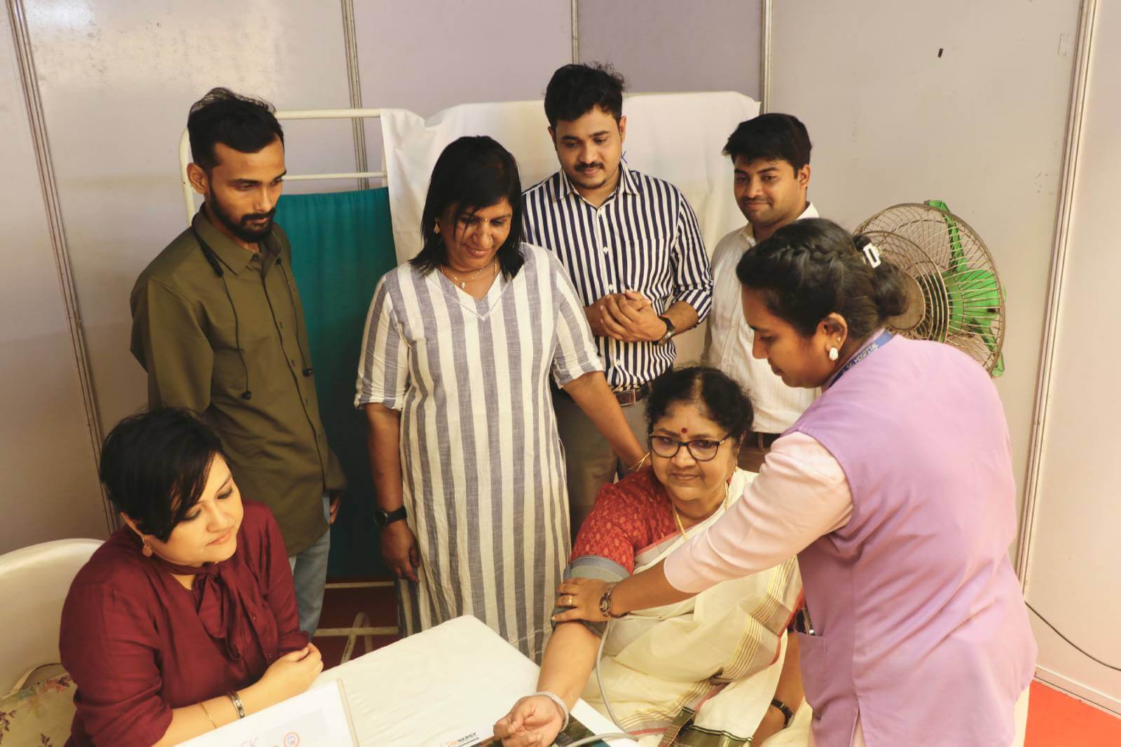 Dr. R Bindu participating in the free medical camp, led by SK Hospital, in association with the event at Bhavani.