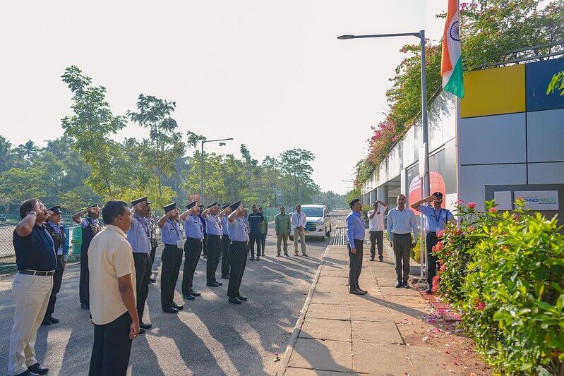 Shri Madhavan Praveen, General Manager-Projects, unfurling the flag at Phase III.